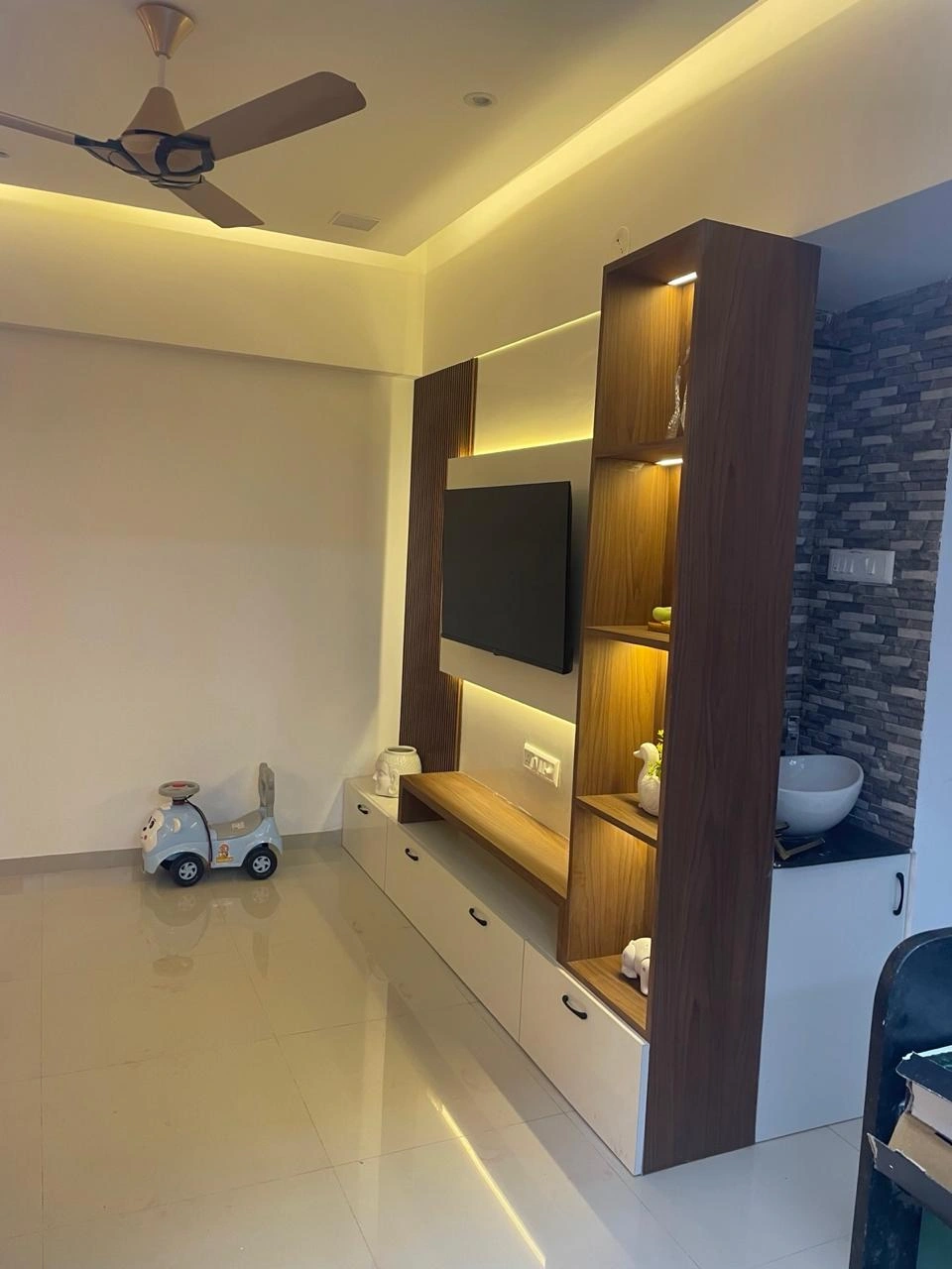 Backlit wooden TV unit with shelves