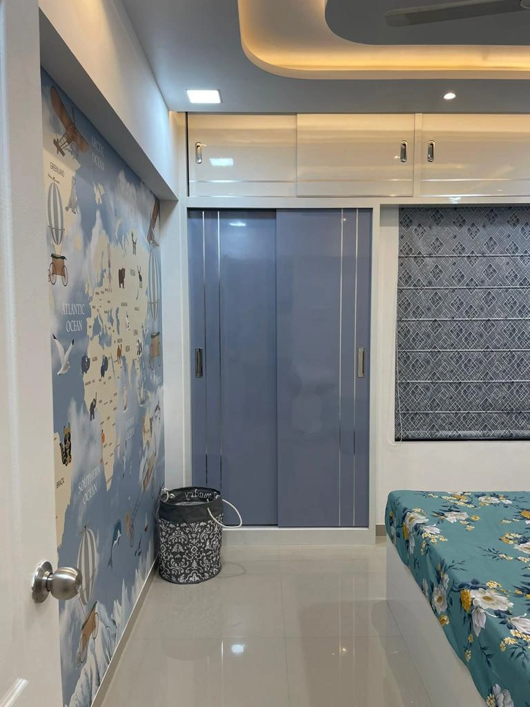 Kids room with world map mural