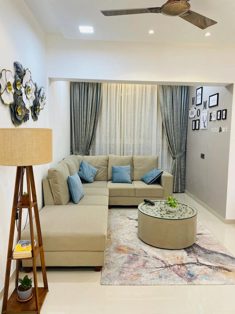 Living room with gallery wall and drapes