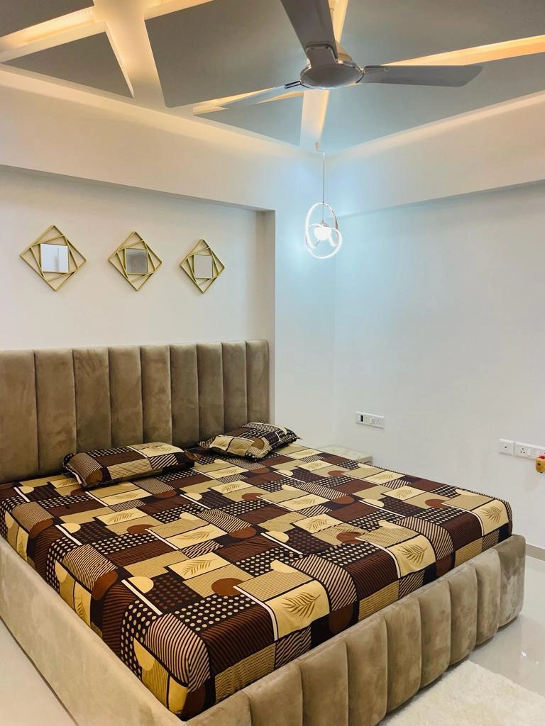 Master bedroom with coffered false ceiling